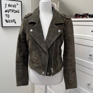 Olive green suede cropped moto jacket.